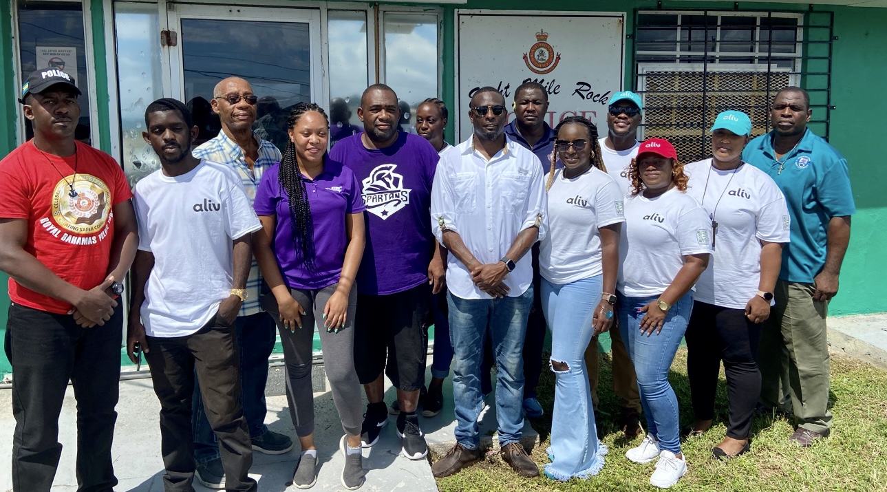 Dennis Deleveaux with colleagues and community partners during a historical business outreach event